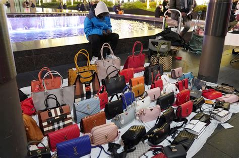 can you go to jail for selling fake designer bags|selling designer handbags.